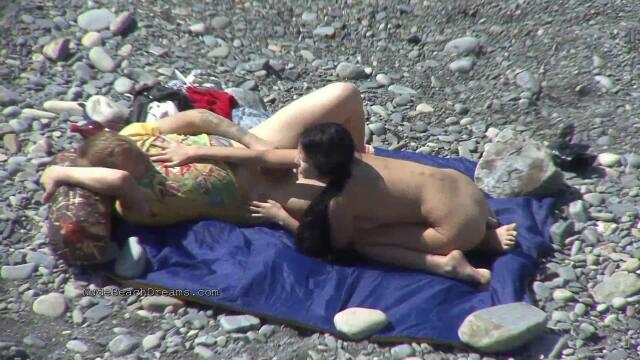 Nude Brunette Orgy in the Beach